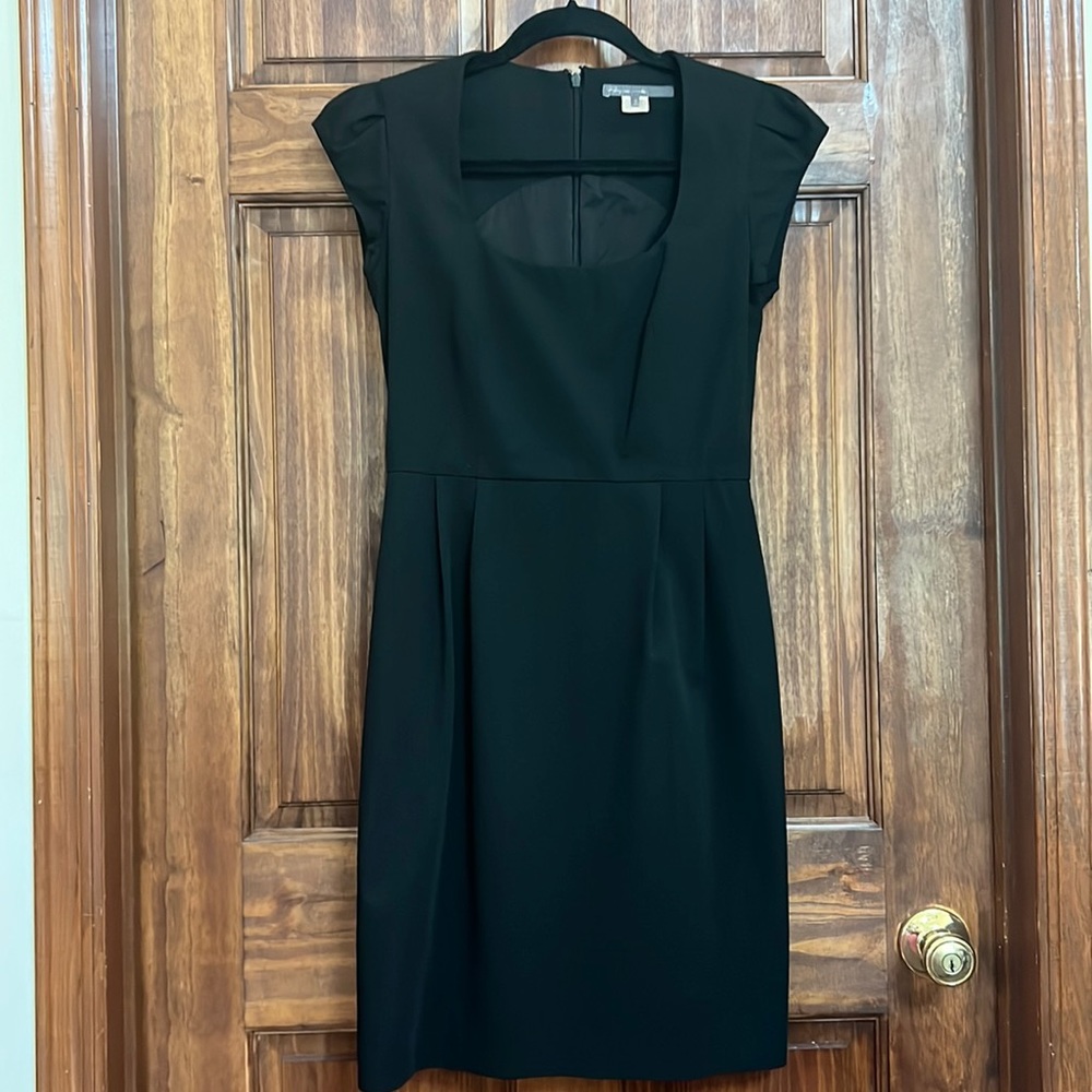 Cap-sleeved black dress